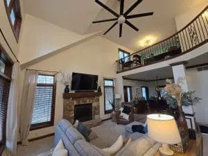 Professional interior home painting services by Stahl Painting Company, showcasing a beautifully repainted living room and vaulted ceiling.
