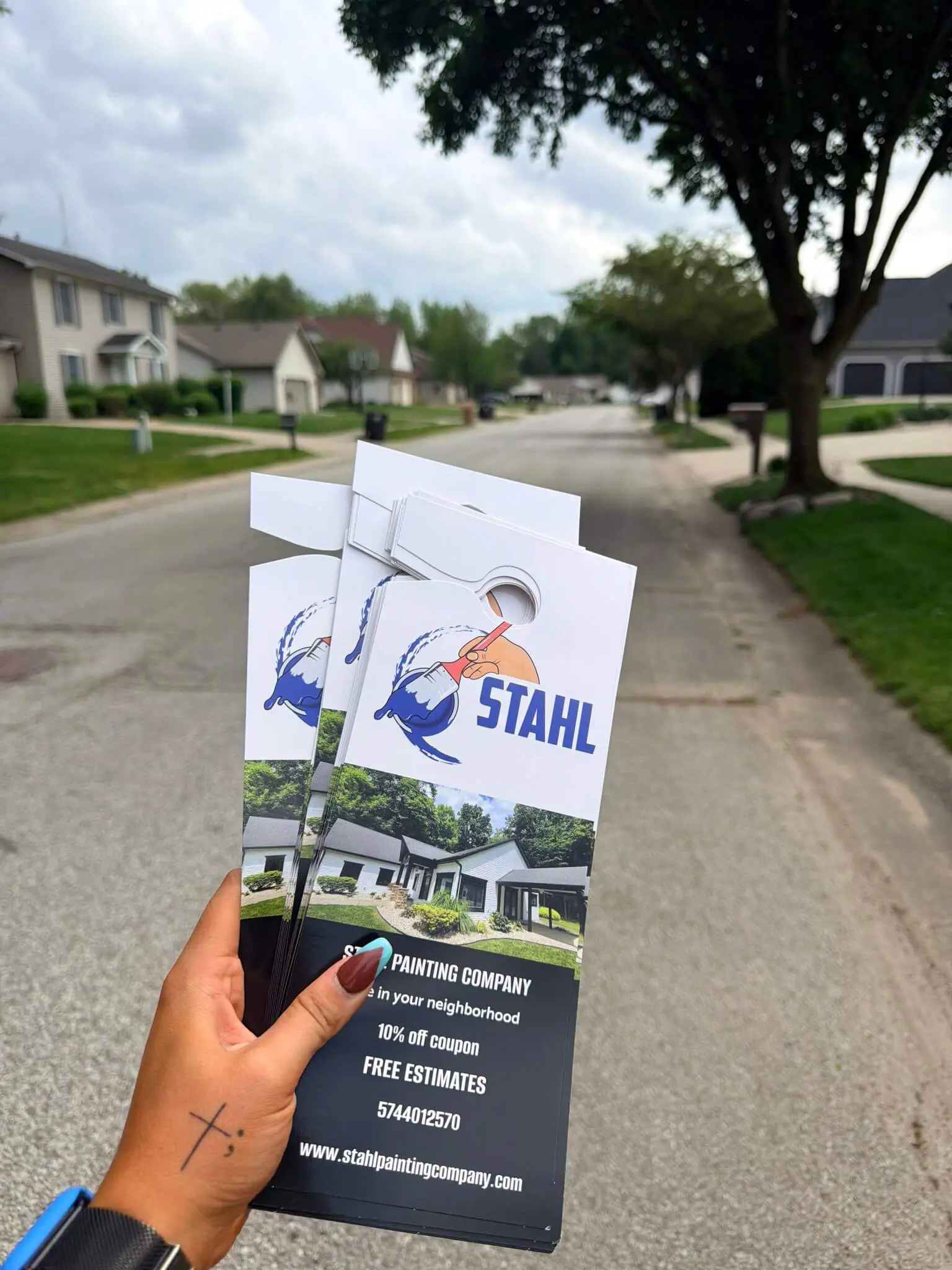 Stahl Painting Company branded door hanger, used by our team to provide local homeowners with painting estimates and coupons.
