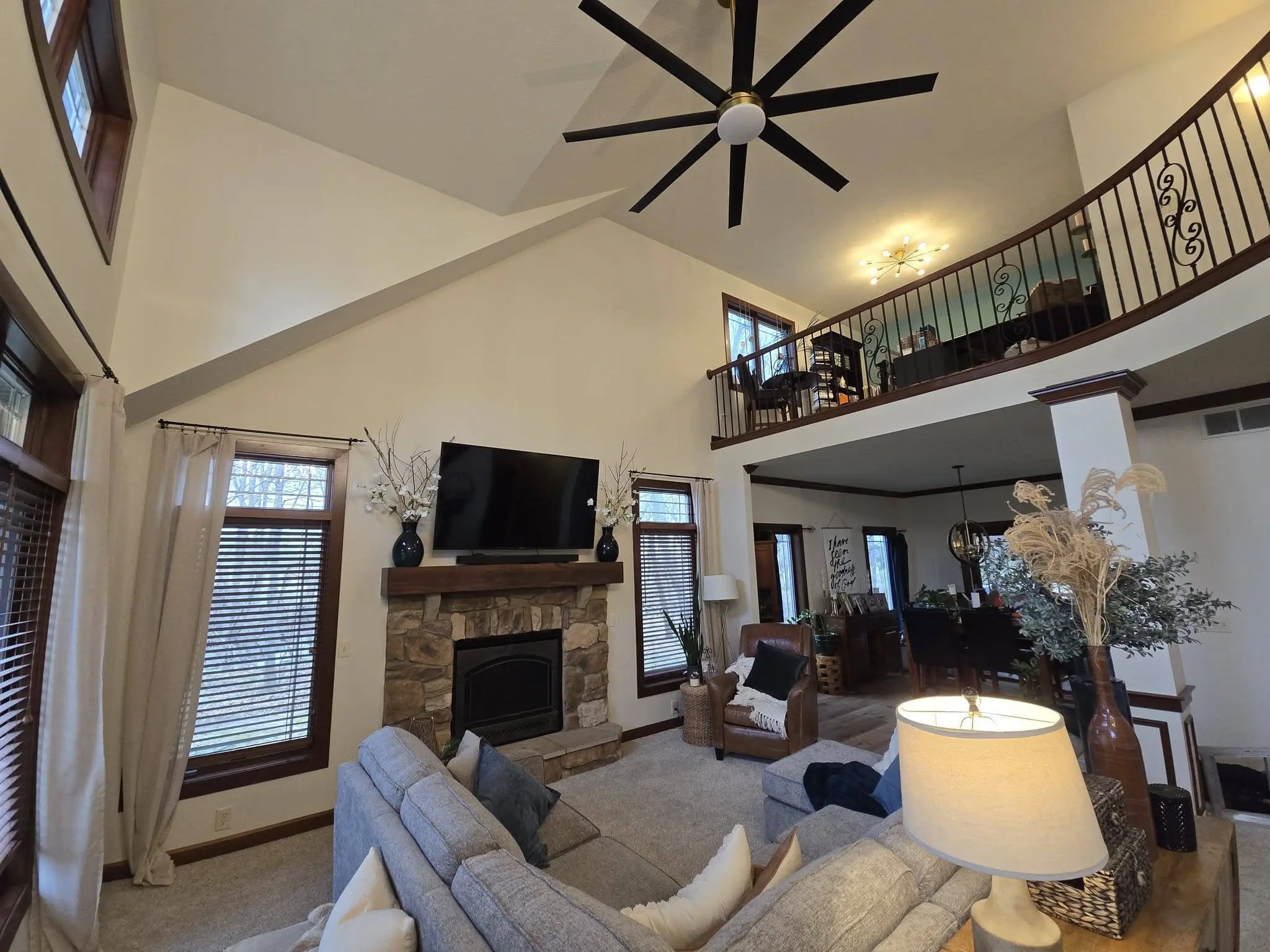 Professional interior home painting project by Stahl Painting Company, showcasing a beautifully updated living room with vaulted ceilings.
